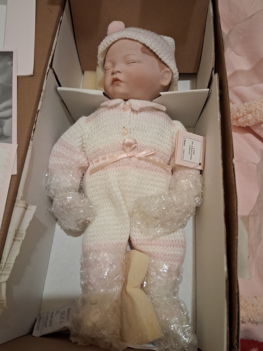 Porcelain Baby Doll in Cream & Pink Knit Outfit 13"